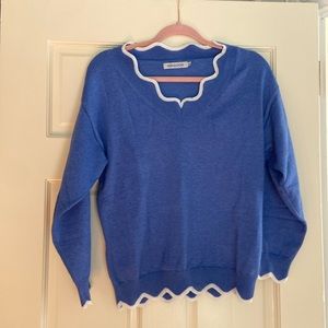 Fun light weight periwinkle sweater with white piping